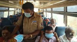 Bus driver in India hands out free masks to protect passengers from coronavirus