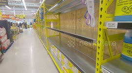 Toronto Canada grocery stores running out of supplies and left with empty shelves due to COVID-19 panic buying of food and toilet paper as the deadly coronavirus pandemic worsens by the hour