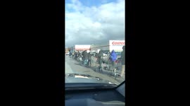 Coronavirus: Costco line goes around parking lot during panic buying spree