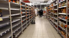 Coronavirus panic buying clears Latvia supermarket shelves