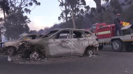 Cars and homes destroyed as firefighters battle blaze on slopes of Table Mountain