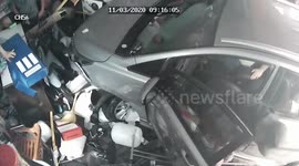 Alleged drunk driver smashes car into shop injuring customers at checkout counter in Thailand