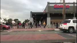 Hundreds line up as LA order closures of bars, gyms, theatres, restaurants