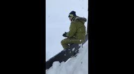 Front flip off a bridge into deep snow