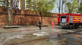 Firefighters spray popular tourist spots with disinfectant in Thailand