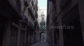 Empty streets and closed stores in the old town of Barcelona due to the Coronavirus Lockdown