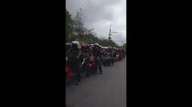 Long queues of vehicles at coronavirus military checkpoint in the Philippines