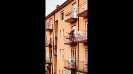 Help! Singer takes to his balcony to sing the Beatles during Italy's COVID-19 lockdown