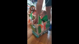 Adorable baby boy in Ireland celebrates isolated St. Patrick Day's Parade