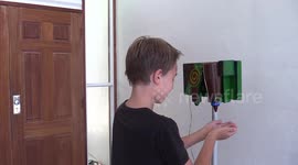 Watch this ingenious science teacher create hand sanitiser dispenser from parts he found around his house