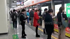 Chinese city runs free public transport trial as companies reopen after coronavirus outbreak slows