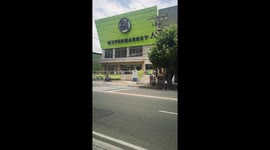 Long queues outside grocery store in the Philippines during lock down