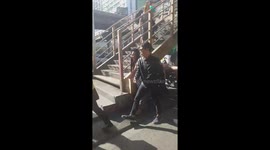 Good samaritan hands our free hand sanitiser to help stop coronavirus spread