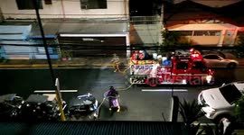 Firefighters disinfect street in the Philippines to avoid the spread of coronavirus