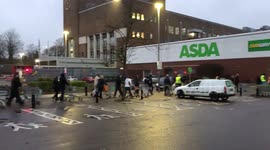 Over 100 shoppers queue outside ASDA at 6 a.m. in north London