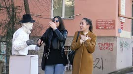 Funny 'human statue' terrifies and amuses passers-by in Georgia Republic