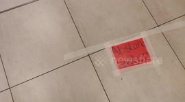 In German supermarkets and shops, at least one-meter distance between people must be maintained to slow down the spread of the coronavirus