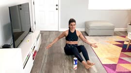 Personal trainer goes through her self-isolation workout using canned food