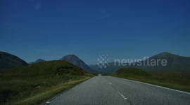 Dashcam of driving past Glen Coe in the Scottish Highlands