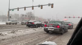 Winter returns to North America as motorists wait in blizzards at Sioux Falls