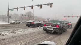 Winter returns to South Dakota as snow blankets highway in Sioux Falls