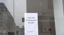 despite corona crisis, this shop owner is cheering up with a positive message
