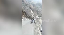 Sudden landslide in northern India leaves hundreds of vehicles stranded