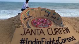 Sand artist builds sculpture urging Indians to stay at home