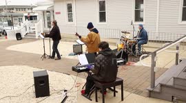 Church band performs outside during 'drive-up' service amid corona virus outbreak