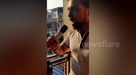 Aspiring singers take to balcony in support of emergency workers by singing ' Go Corona Go' in Delhi