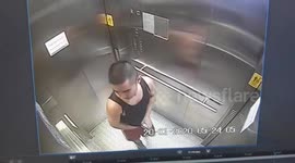 Disgusting moment man wipes saliva inside train station lift during coronavirus outbreak