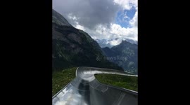 Breathtaking rollercoaster ride down Swiss alpine mountains