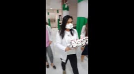 Doctors surprise colleague with birthday cake during Covid-19 lockdown in the Philippines