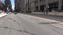 COVID-19 leaves Toronto downtown streets empty as people ordered to stay inside and businesses close due to coronavirua pandemic