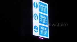 Down Brick Lane An Advertising Board Shows A Bunch Of Coronavirus Adverts Including One From  A Fashion Brand