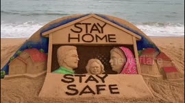 Sand artist creates
