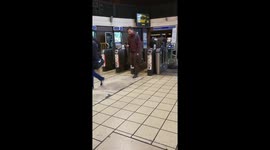 London Underground station busy with commuters on day one of lockdown