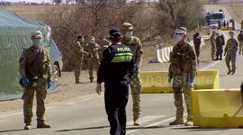 Georgian servicemen stand guard at a check point in Marneuli