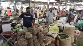 Crowds flock to market to stock up on supplies amid nationwide lockdown in India