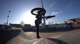 Cool BMX Bike Jump Trick in Skatepark