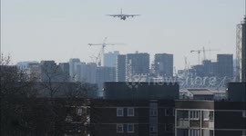 Royal Air Force C130J Hercules cargo plane carries out a practice landing and takeoff at London City Airport 24th March 2020