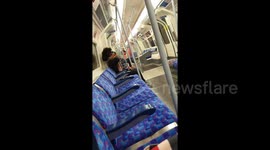 Woman caught smoking cigarette on London Underground carriage