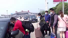 Vehicles queue up on highway to enter Wuhan after nearly two-month coronavirus lockdown