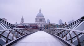 Cyclist on cloudy St Pauls footbridge during Coronavirus outbreak