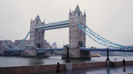 Jogger runs past Tower Bridge during the Coronavirus outbreak