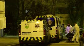 Ambulance arrives at Madrid home to transport coronavirus victim