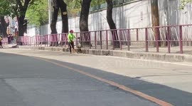 Street sweepers clean rubbish away during Philippines Covid-19 lockdown