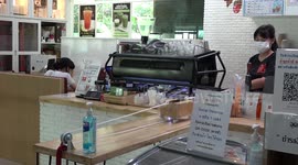 Thai coffee shop uses pulleys to follow social distancing rules while serving customers