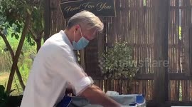 Chef cooks meals for medics treating Covid-19 patients in northern Thailand