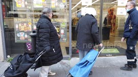 CORONAVIRUS IN PARIS: Shoppers queue for essentials